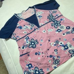 Comfortable scrubs top . Super soft . Pink and navy blue